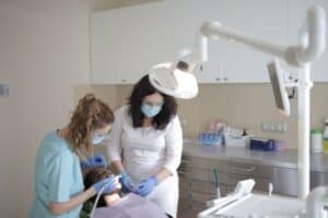 Tooth pain can range from mild discomfort to unbearable agony. While a slight ache may disappear on its own, there are clear signs your tooth pain requires immediate dental attention. Ignoring these symptoms can allow infections to spread, damage nearby teeth, or even affect your overall health. Recognizing these warning signs early helps you receive prompt treatment, reduce complications, and preserve your natural smile. What Causes Tooth Pain? Tooth pain develops for many reasons, including: Tooth decay Gum disease Cracked or broken teeth Dental abscesses Worn enamel Impacted wisdom teeth Tooth injuries Sometimes the pain is temporary. However, persistent or severe discomfort usually signals an underlying problem that needs professional care. 1. Severe, Persistent Pain One of the biggest signs your tooth pain requires immediate dental attention is intense pain that doesn't improve after several hours. Persistent pain may indicate: Deep cavities Infected tooth pulp Dental abscess Exposed tooth nerve Pain that continues despite over-the-counter medication should never be ignored. 2. Swelling Around the Face or Gums Facial swelling often means bacteria have spread beyond the tooth. Watch for: Puffy gums Swollen cheeks Jaw swelling Tender lymph nodes Swelling combined with pain frequently indicates a dental abscess requiring urgent treatment. 3. Fever with Tooth Pain A fever alongside tooth pain suggests your body is fighting an infection. Symptoms include: Chills Fatigue Elevated temperature General weakness If untreated, serious infections may spread to other parts of the body. 4. Tooth Pain After Trauma Falls, sports injuries, or accidents can crack or loosen teeth even when no damage is immediately visible. Seek prompt care if you experience: Sharp pain after impact Broken tooth Tooth displacement Bleeding Early treatment greatly improves the chances of saving the affected tooth. 5. Bleeding or Pus Around the Tooth Pus is never normal. You may notice: Bad taste Bad breath Gum swelling Yellow or white discharge These symptoms strongly suggest an abscess that requires immediate drainage and professional treatment. 6. A Loose Adult Tooth Adult teeth should never become loose. Possible causes include: Advanced gum disease Bone loss Trauma Infection Prompt evaluation can sometimes prevent permanent tooth loss. 7. Difficulty Eating or Opening Your Mouth If chewing becomes painful or you cannot fully open your mouth, your condition may be worsening. These symptoms may indicate: Severe infection Jaw inflammation Wisdom tooth complications Muscle involvement Don't wait for the discomfort to become unbearable. 8. Pain That Keeps You Awake Nighttime tooth pain often points to inflammation inside the tooth. Many people notice: Throbbing pain Pressure while lying down Constant aching Increased sensitivity Sleep disruption is one of the strongest indicators that dental treatment is needed promptly. 9. Sensitivity That Doesn't Go Away Temporary sensitivity after cold foods is common. However, lingering pain after: Cold drinks Hot coffee Sweet foods Air exposure may indicate nerve damage or advanced decay. If sensitivity lasts more than a few seconds after removing the trigger, schedule a dental appointment. Preventing Dental Emergencies Although not every dental problem is preventable, good habits significantly reduce your risk. Daily Oral Care Brush twice daily with fluoride toothpaste. Floss every day. Replace your toothbrush every three months. Limit sugary snacks. Drink plenty of water. Regular Dental Visits Routine dental checkups help identify small problems before they become emergencies. Professional cleanings also reduce plaque buildup and improve gum health. When Should You Visit an Emergency Dentist? Seek immediate dental care if you experience: Symptom Urgency Severe pain Immediate Facial swelling Immediate Fever Immediate Pus drainage Immediate Knocked-out tooth Within 30 minutes Broken tooth Same day Loose adult tooth Same day The sooner treatment begins, the greater the chance of saving your tooth. For additional oral health information, visit the American Dental Association at https://www.ada.org. Frequently Asked Questions 1. Can tooth pain go away without treatment? Sometimes mild sensitivity improves, but persistent pain usually indicates an underlying dental issue that requires evaluation. 2. Is swelling always an emergency? Swelling often signals infection. If swelling spreads or affects breathing or swallowing, seek emergency medical care immediately. 3. Can I treat a dental abscess at home? Home remedies may temporarily reduce discomfort but cannot eliminate the infection. Professional dental treatment is necessary. 4. Should I visit the emergency room for tooth pain? Visit an emergency room if tooth pain is accompanied by difficulty breathing, severe facial swelling, or uncontrolled bleeding. 5. How long should I wait before seeing a dentist? If pain lasts longer than one or two days or becomes severe, schedule an appointment as soon as possible. 6. Can regular dental checkups prevent emergencies? Yes. Routine examinations help identify cavities, gum disease, and other conditions before they become painful emergencies. Conclusion Knowing the signs your tooth pain requires immediate dental attention can make a significant difference in protecting your oral health. Severe pain, swelling, fever, bleeding, pus, trauma, loose teeth, persistent sensitivity, and difficulty chewing are all warning signs that deserve prompt evaluation. Acting early often prevents more extensive treatment, reduces discomfort, and helps preserve your natural teeth. If you experience any of these symptoms, contact your dentist without delay. Timely care is the best investment in a healthy, confident smile.